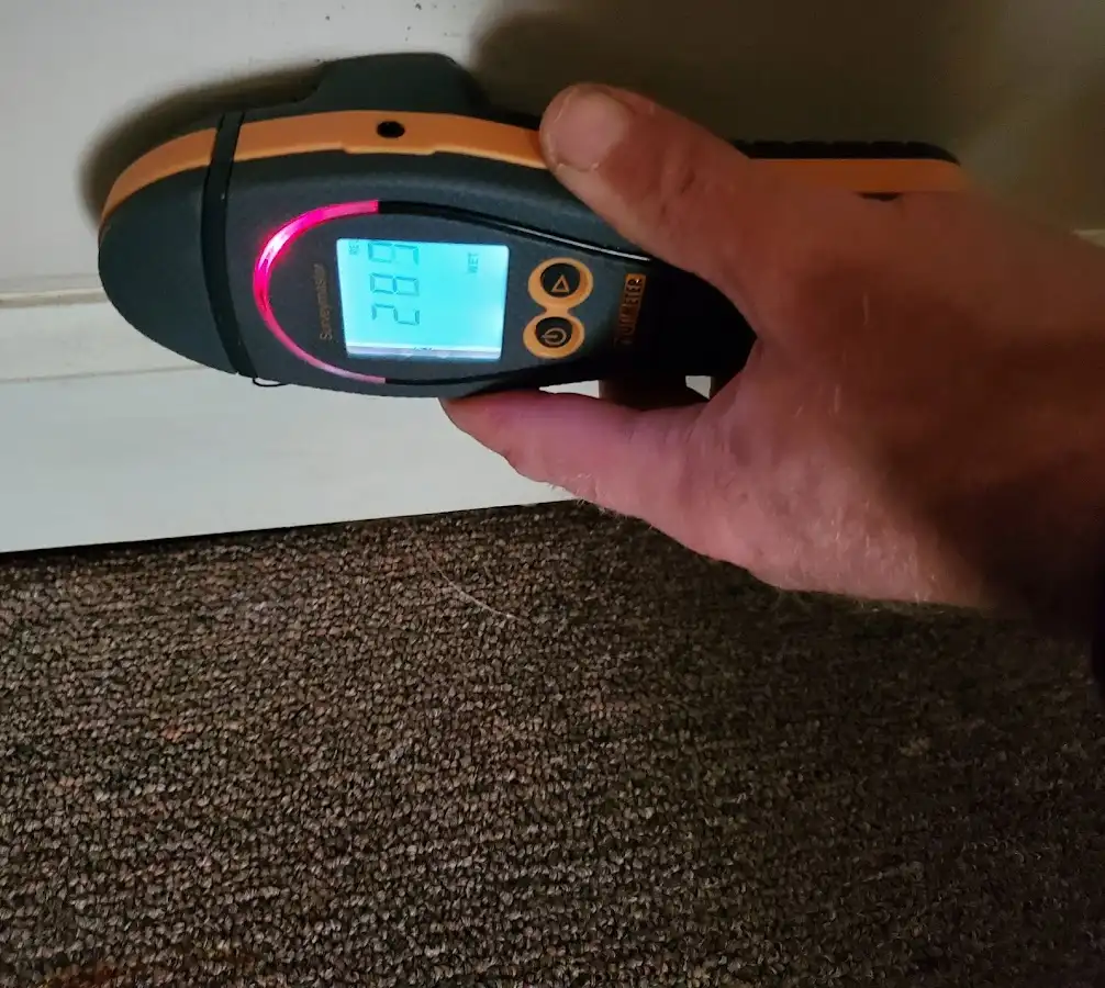Moisture detection at baseboard during Sewage Cleanup & Sanitation in Channelview